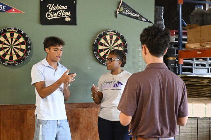Members working together on an interview at the October 2026 Wake Dems event